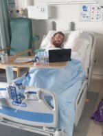 Living kidney recipient Will asleep in a hospital bed