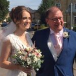 Image of Kathryn with her dad on her wedding day